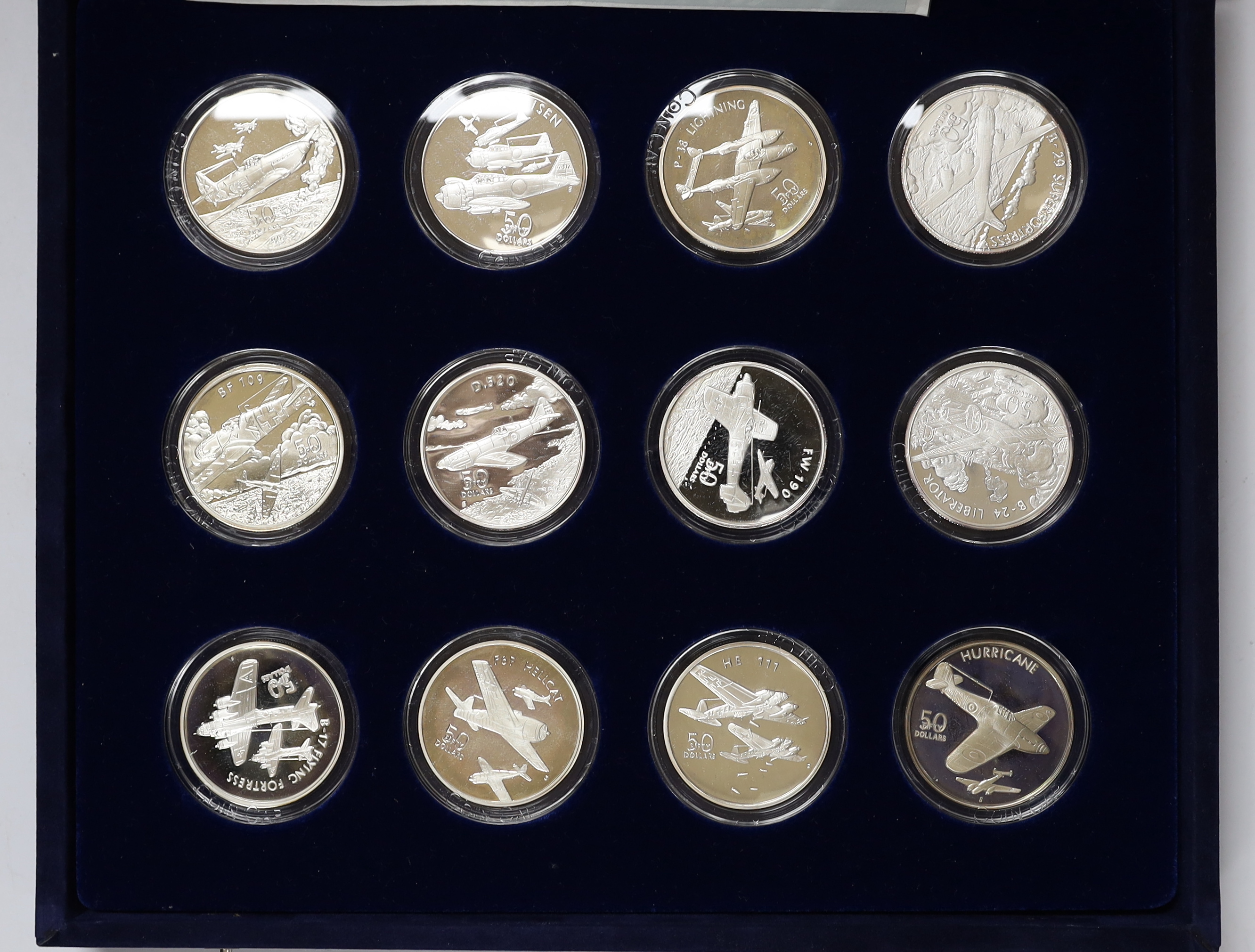 Republic of Marshall Islands, Legendary aircraft of World War II, set of 24 proof silver coins, cased certificate and the Heroes of the North proof silver coin 1993